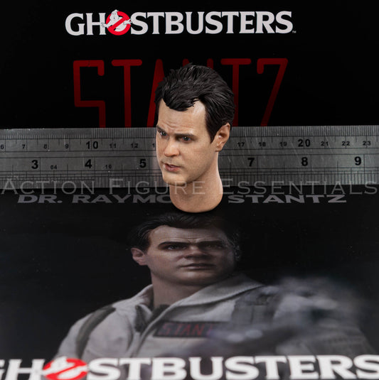 Blitzway Ghostbusters Dr Raymond Stantz 2.0 head sculpt in 1/6 scale, showing Dan Aykroyd’s likeness and detailed facial paintwork