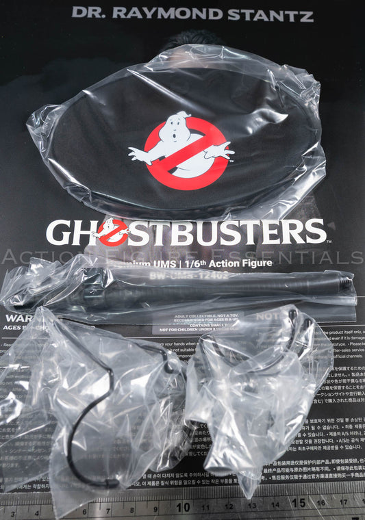 Blitzway Ghostbusters Dr Raymond Stantz 2.0 black oval display base with Ghostbusters logo, support pole and figure-support fittings in 1/6 scale