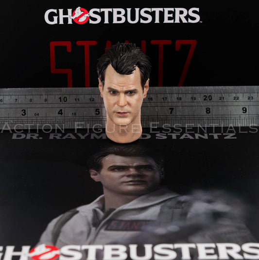 Blitzway Ghostbusters Dr Raymond Stantz 2.0 head sculpt in 1/6 scale, showing Dan Aykroyd’s likeness and detailed facial paintwork