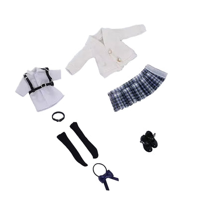 Collection of doll clothes and accessories on a gray background with 