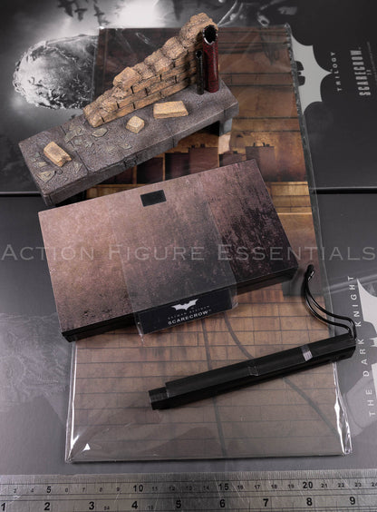 Hot Toys Scarecrow 2.0 MMS801 city sewer diorama display set with weathered brick wall, pipes, rubble, display base and printed backdrop
