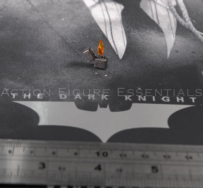 Hot Toys Scarecrow 2.0 MMS801 miniature open lighter with metallic-style finish and translucent orange flame effect for 1/6 scale figure