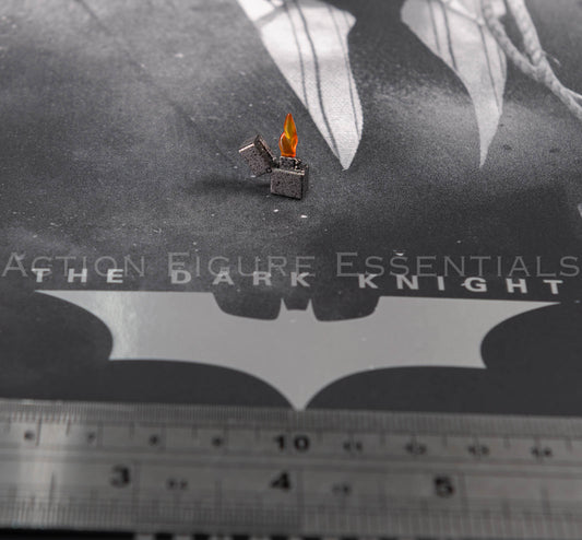 Hot Toys Scarecrow 2.0 MMS801 miniature open lighter with metallic-style finish and translucent orange flame effect for 1/6 scale figure