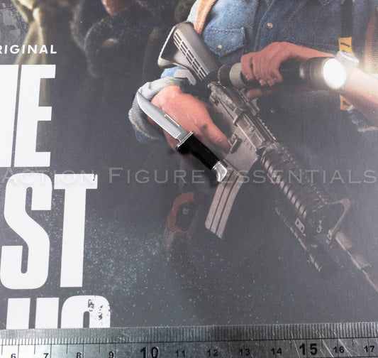 Hot Toys Joel Miller 1/6 scale combat knife with silver-coloured blade, shaped guard and black handle
