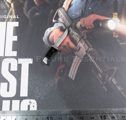 Hot Toys Joel Miller 1/6 scale combat knife with silver-coloured blade, shaped guard and black handle