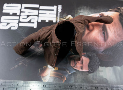 Hot Toys Joel Miller brown waxed jacket in 1/6 scale, showing front pockets, button details and weathered fabric