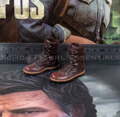Hot Toys Joel Miller brown boots in 1/6 scale, showing sculpted laces, detailed stitching and weathered leather-effect paintwork