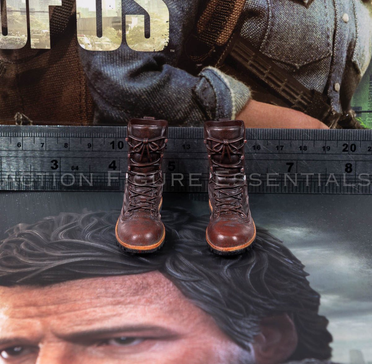 Hot Toys Joel Miller brown boots in 1/6 scale, showing sculpted laces, detailed stitching and weathered leather-effect paintwork