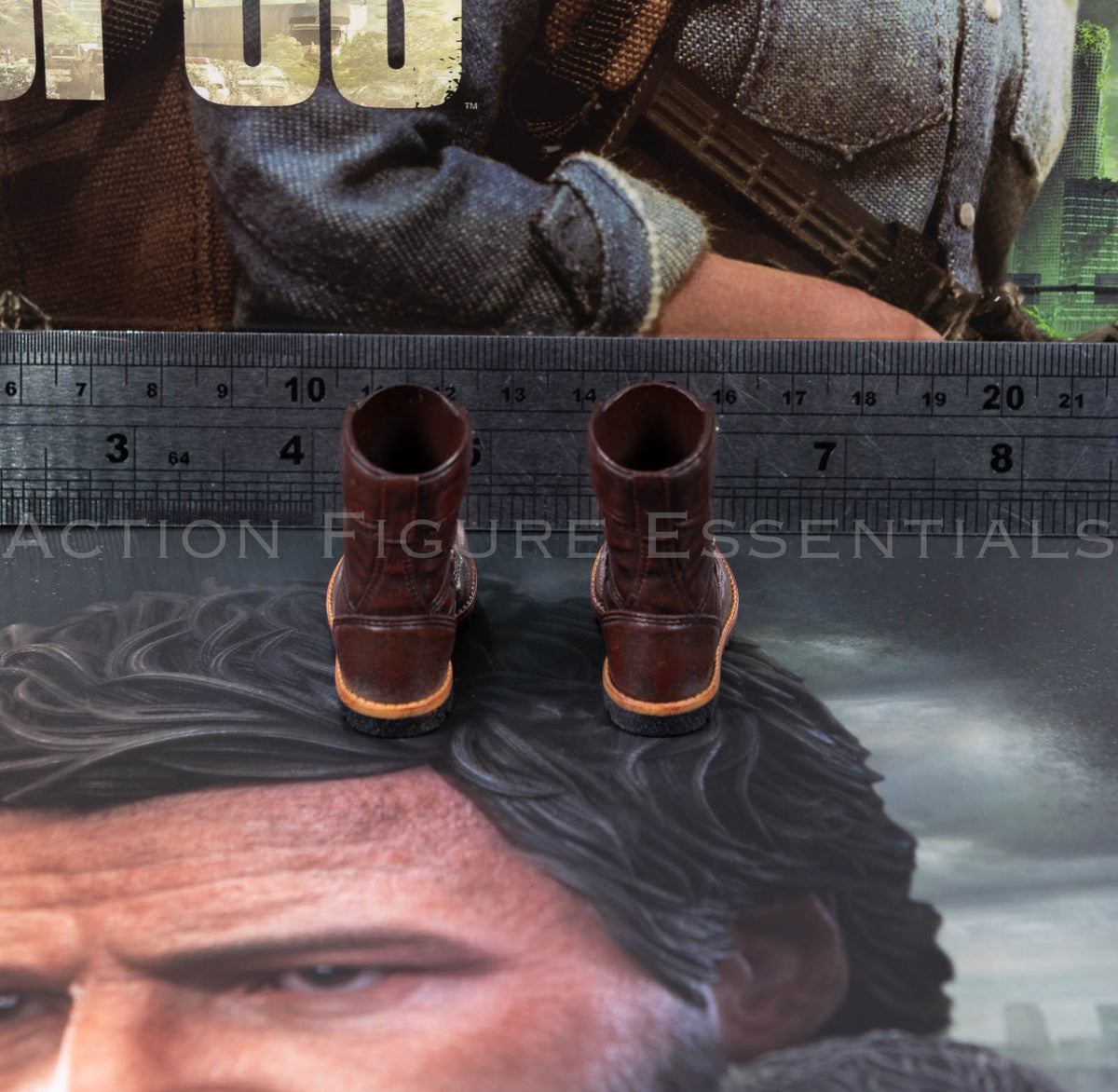Hot Toys Joel Miller brown boots in 1/6 scale, showing sculpted laces, detailed stitching and weathered leather-effect paintwork