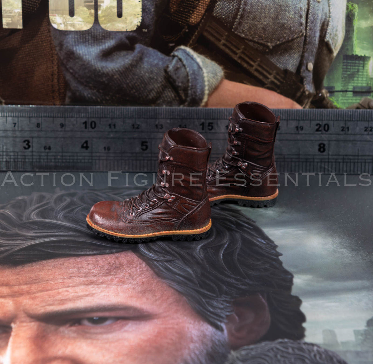 Hot Toys Joel Miller brown boots in 1/6 scale, showing sculpted laces, detailed stitching and weathered leather-effect paintwork