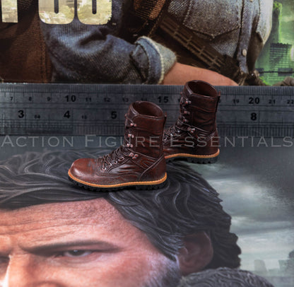 Hot Toys Joel Miller brown boots in 1/6 scale, showing sculpted laces, detailed stitching and weathered leather-effect paintwork
