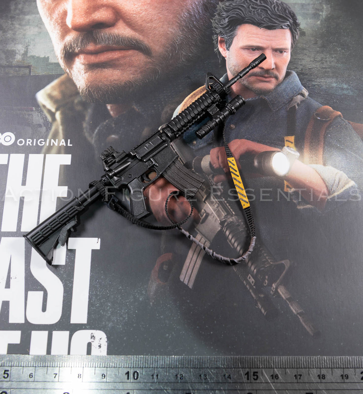 Hot Toys Joel Miller 1/6 scale assault rifle with fabric sling, yellow strap detailing, mounted torch and removable magazine